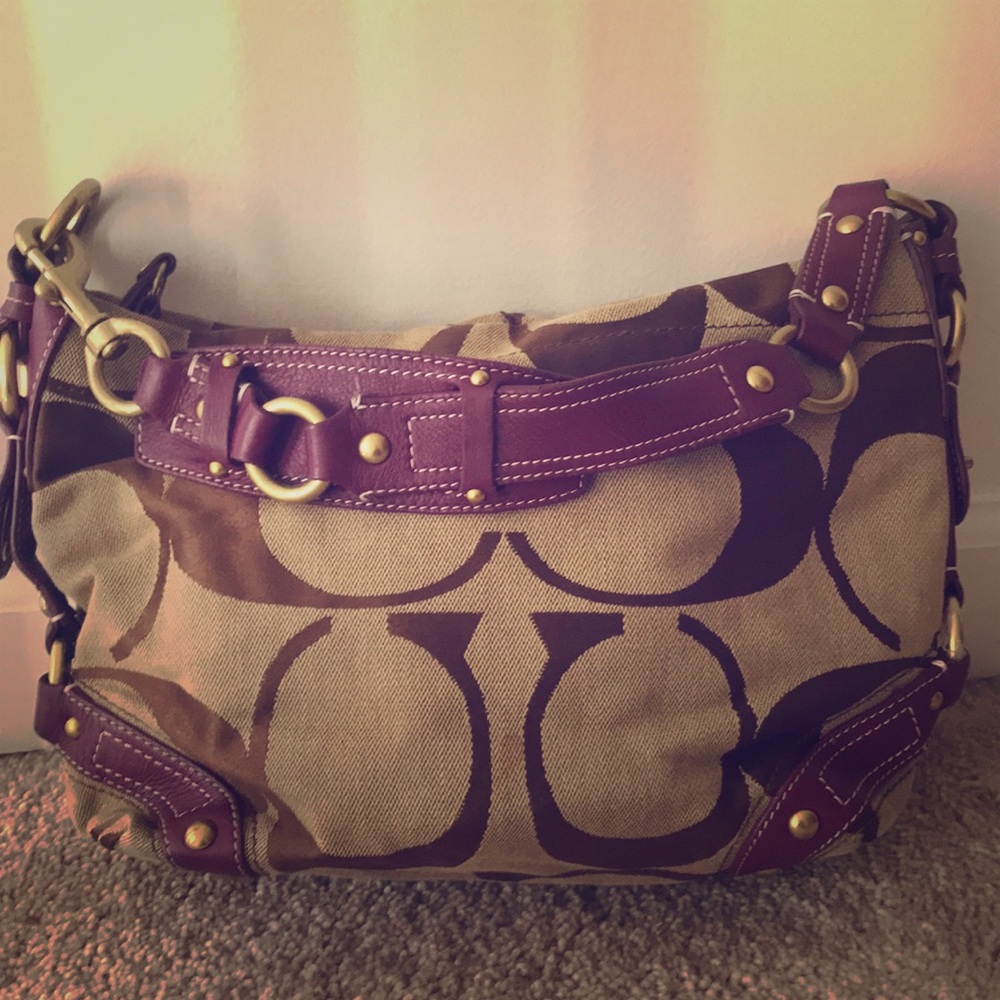 Coach bag with Coach logo and purple leather